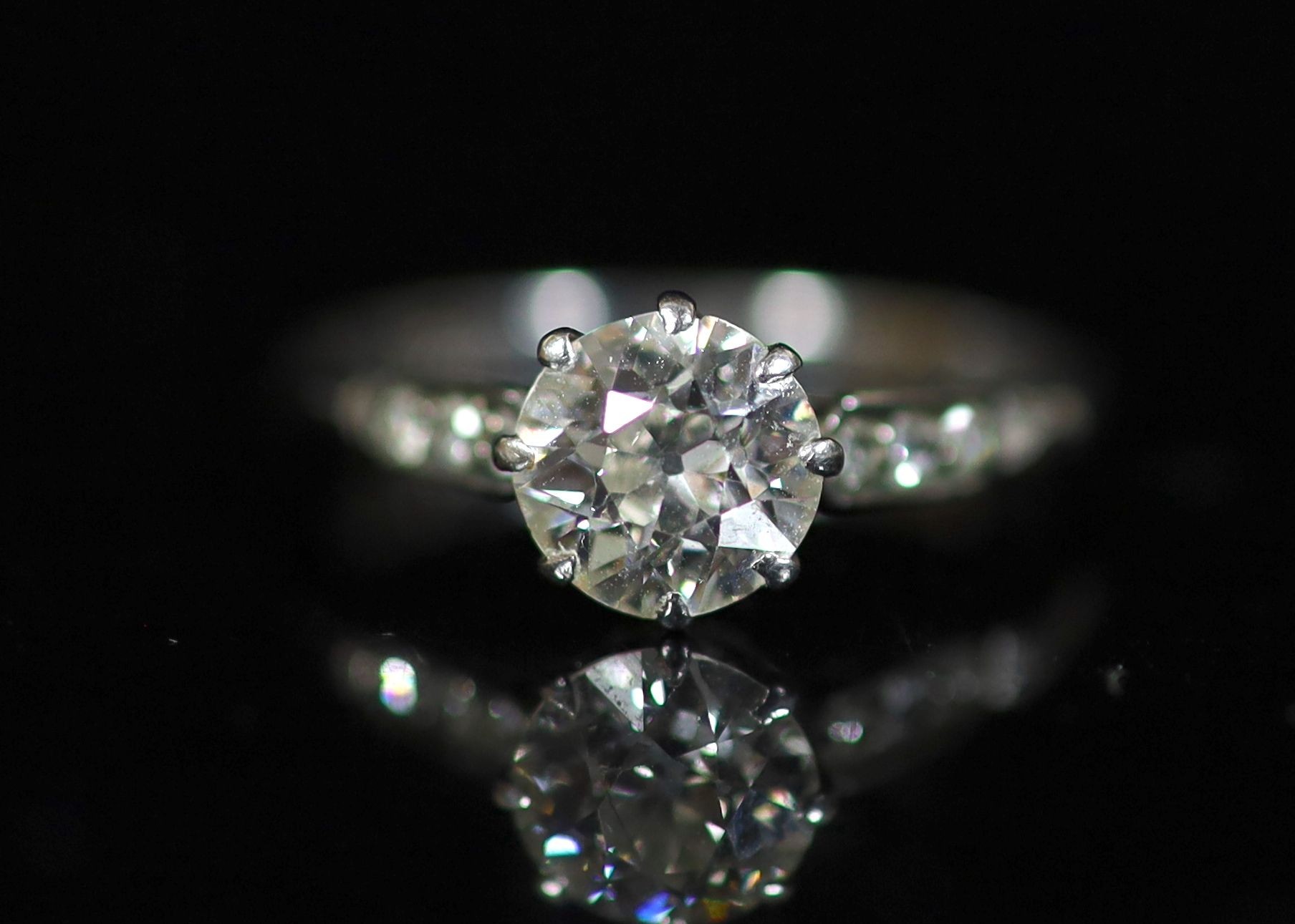 An 18ct white gold and single stone diamond ring